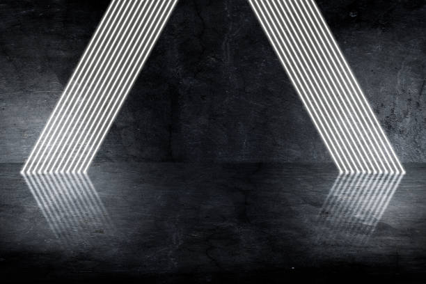 Pyramid consisting of glowing stripes. Glowing triangle in dark space. Abstract glowing pyramid. stock photo