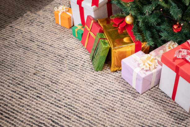 istock Close-up on gifts by the Christmas tree 1164561337