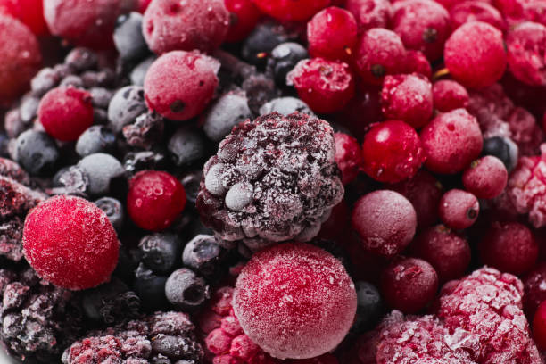 istock Frozen berries closeup. Cherries, currants, blueberries, blackberries