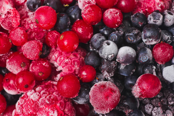 istock Frozen berries closeup. Cherries, currants, blueberries, blackberries