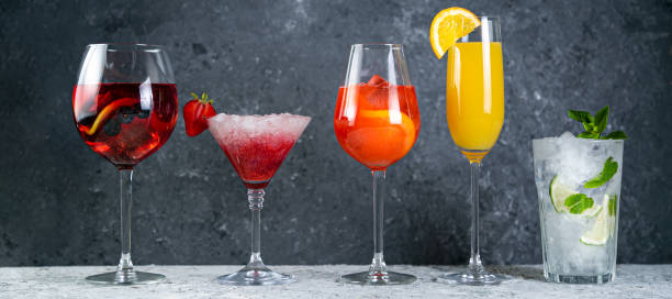istock Selection of refreshing summer drinks - mojito, sangria, mimosa, aperol, martini, rustic background 1164563224