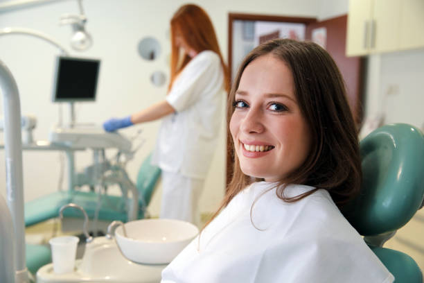 istock Young Woman at the Dentist 1164564497