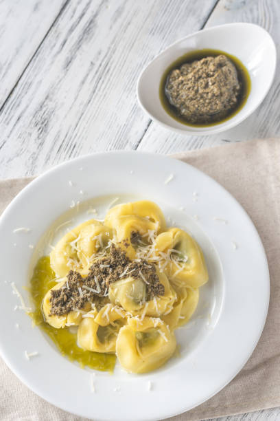 istock Tortelloni stuffed with ricotta with pesto 1164565036