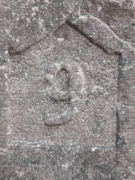 istock Number nine carved in granite 1164565781