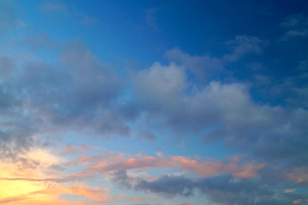 istock Large white cumulus clouds on a blue sky for background or ecology or nature. 1164567021