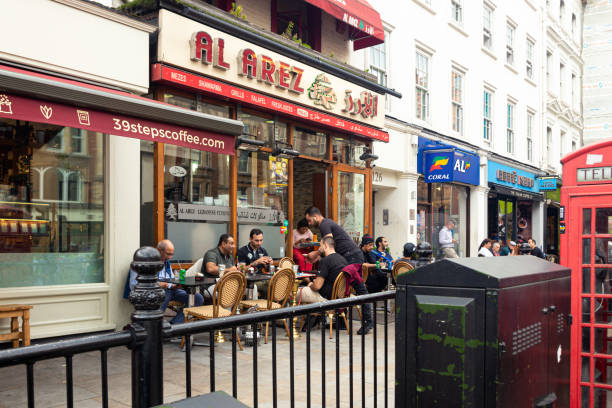 London / UK - July 18, 2019: arabs sitting in a lebanon cafe on the Brompton Road in Knightsbridge
