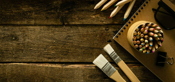 istock BAck to school concept - supplies on wood background 1164568494