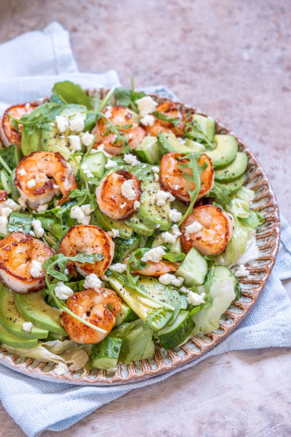 istock salad with avocado and shrimps 1164573860