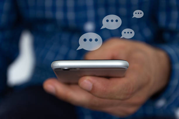 istock Hand of man typing text on mobile smartphone. Online  chat chatting on application communication digital media website and social network. 1164578149