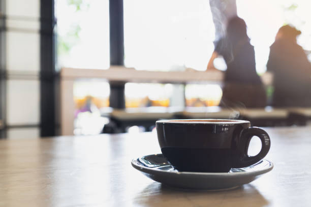 istock Close up espresso coffee in a black coffee mug 1164579166
