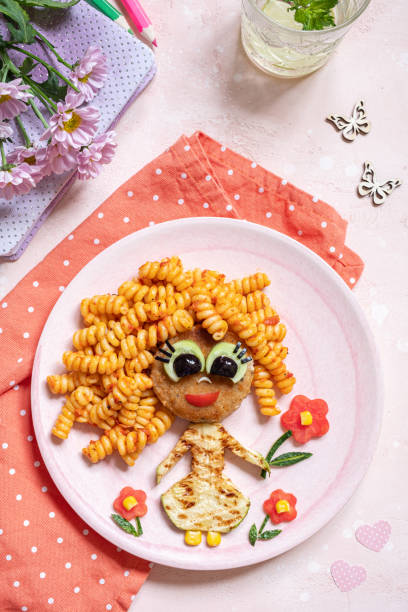istock Funny Girl Food Face 1164580015