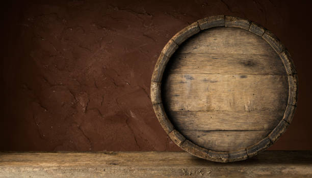 istock Old Wooden Beer Barrel on the Dark Background. 1164581275