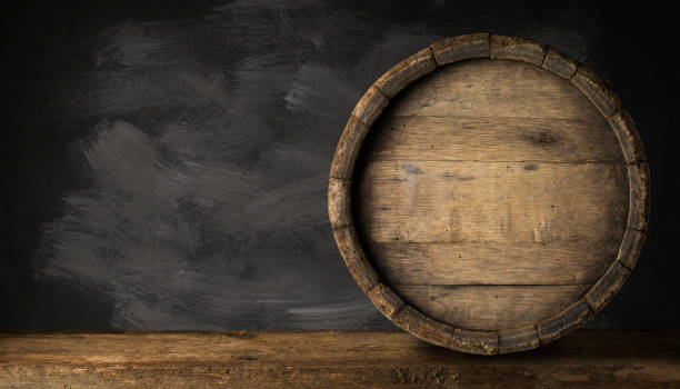 istock Old Wooden Beer Barrel on the Dark Background. 1164581277