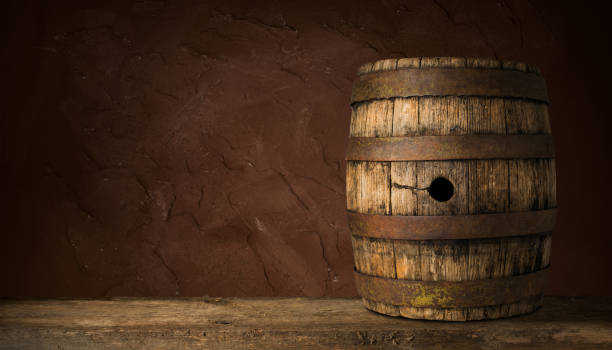 istock Old Wooden Beer Barrel on the Dark Background 1164581297