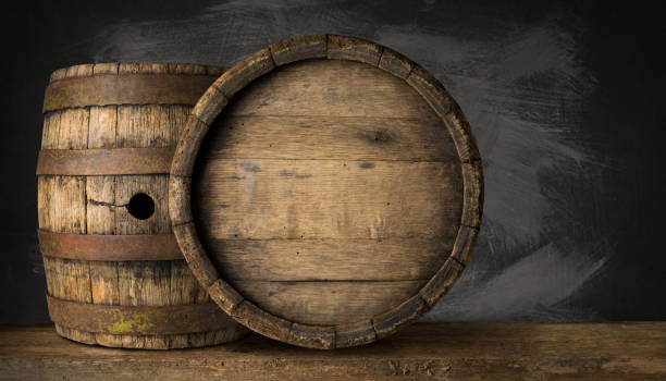 istock Old Wooden Beer Barrel on the Dark Background 1164581315