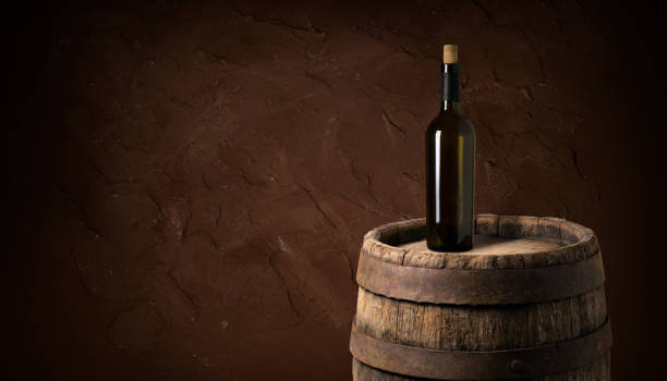 istock Old Wooden Beer Barrel on the Dark Background 1164581355
