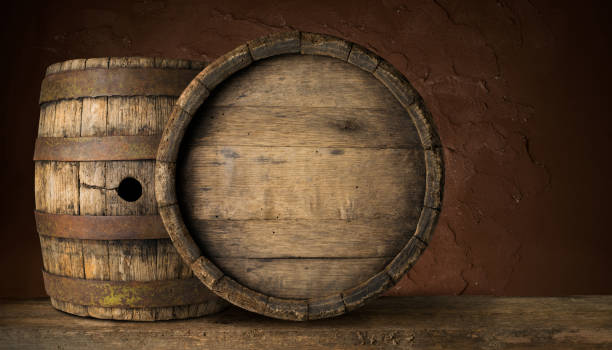 istock Old Wooden Beer Barrel on the Dark Background 1164581357