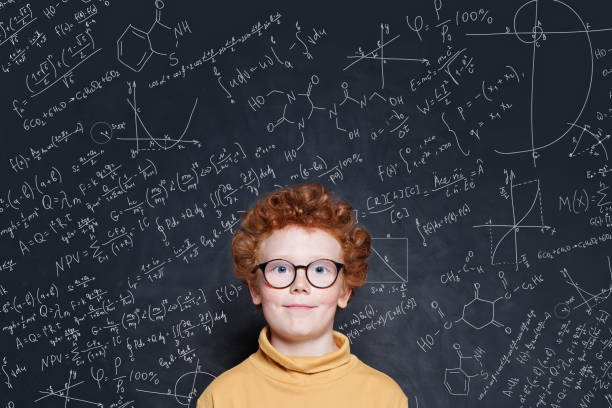 istock Cute little child on science background 1164584354