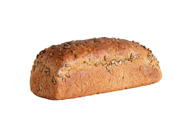 istock Loaf of rye bread with seeds. White isolate Close-up. 1164586588