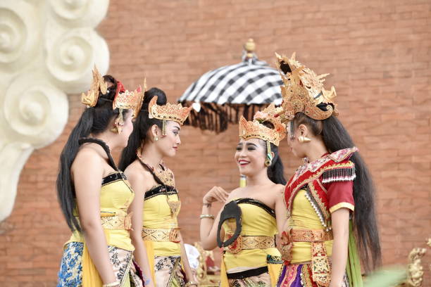 Bali, Indonesia - may 24, 2017: Beautiful Balinese dancer girls in traditional costumes at art and culture event in Garuda Wisnu Kencana Cultural Park Bali