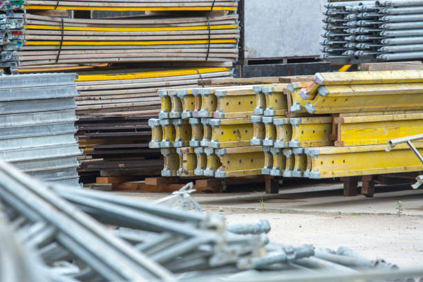 istock Openair storage of galvanized steel and aluminum frames, ladders, and ringlock scaffolding systems for many applications on restoration, industrial and construction sites. 1164590783