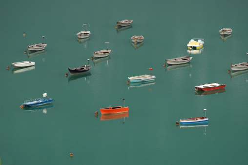 many small boats in the lake