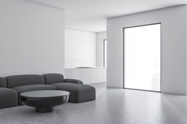 istock White living room and kitchen interior with sofa 1164596038