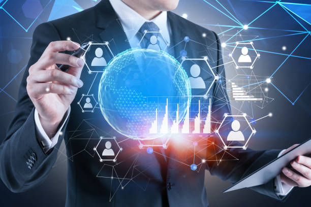 istock Businessman working with social media hologram 1164596130