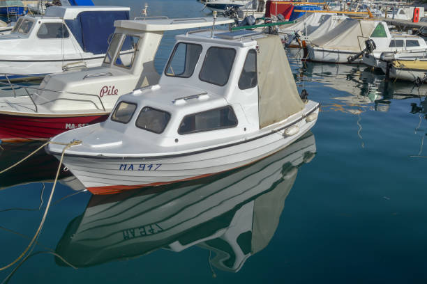 MAKARSKA, CROATIA - JUNE 9: Fisherman's boats in wharf in Makarska, Croatia on June 9, 2019.