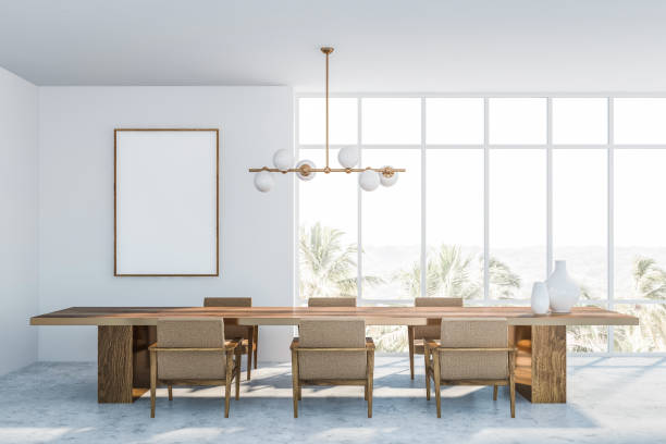 istock White dining room interior, armchairs and poster 1164596477