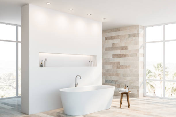 istock White and stone bathroom corner with tub 1164597009