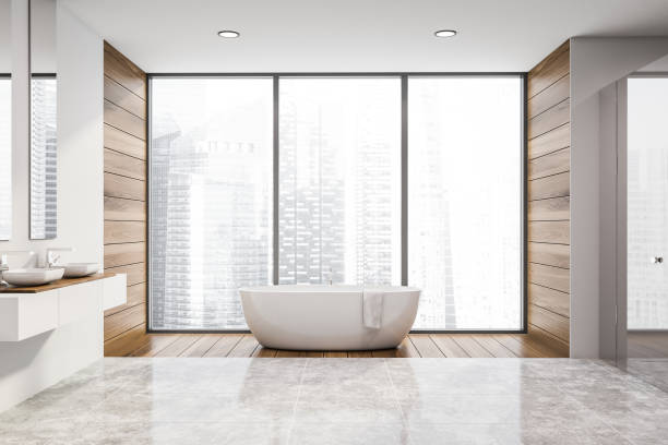 istock White bathroom with double sink and tub 1164597038