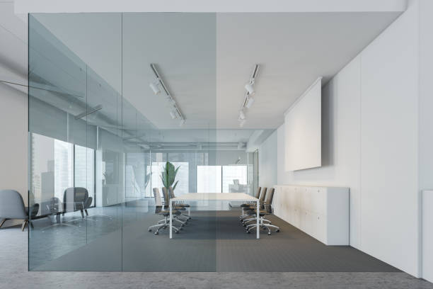 istock White and glass meeting room with screen 1164597093