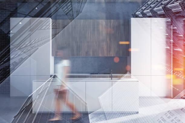 istock Woman walking in white kitchen with island 1164597149