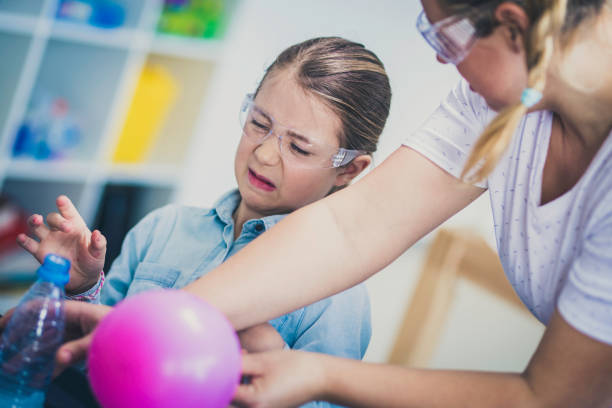 istock Schoolgirl making face 1164599957