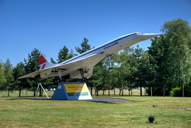Entrance to Brooklands Museum in Surrey United Kingdom Weybridge, Surrey, United Kingdom - July 23, 2019: Signage and model of Concorde at entrance to Brooklands automotive and aviation museum supersonic airplane photos stock pictures, royalty-free photos & images