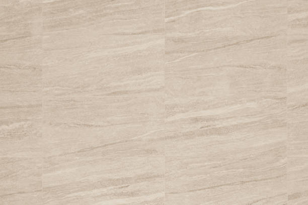 istock Cream granite texture and background or slate tile ceramic, seamless texture square light  beige. Marble tiles seamless floor pattern for design, decor concrete texture wall. 1164609317