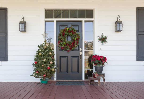 Christmas Decorations At Front Door of House Christmas Decorations At Front Door of House. front door stock pictures, royalty-free photos & images