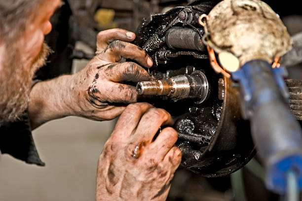 istock Mechanic working on a car brake. 116461031