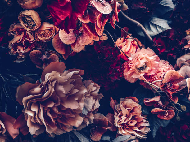 istock artificial flowers wall background with vintage style 1164612824