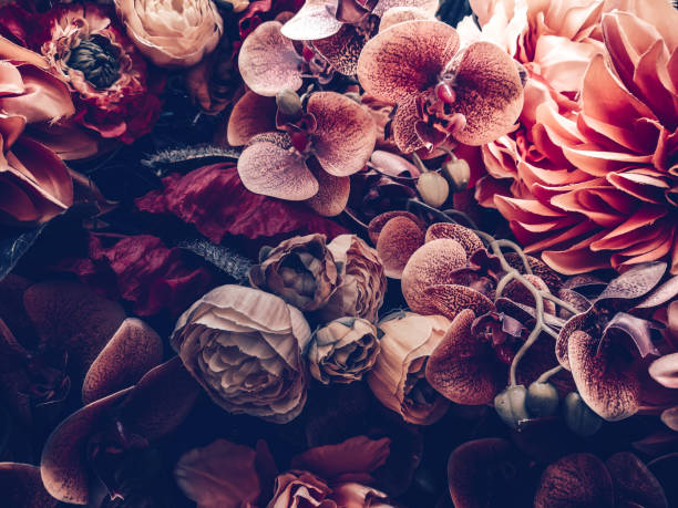 istock artificial flowers wall background with vintage style 1164612825