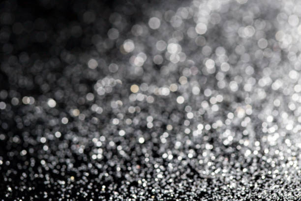 istock background black abstract bokeh for Christmas night light holiday. 1164619770