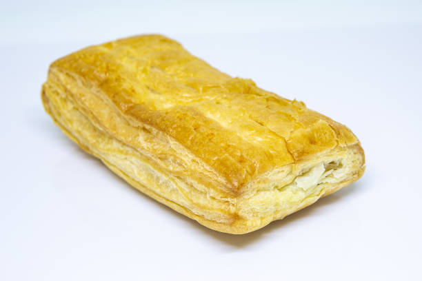 istock Close-Up Of Coconut pie On White Background 1164621960