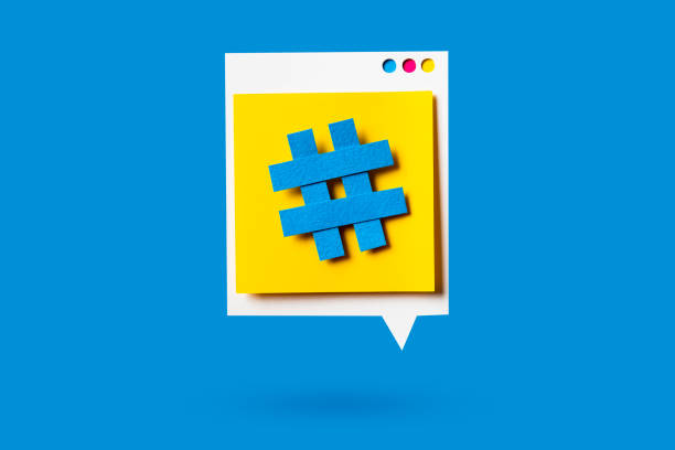 Paper cutout of hashtag symbol on a yellow speech bubble on blue background. Concept of social media and digital marketing. vector art illustration