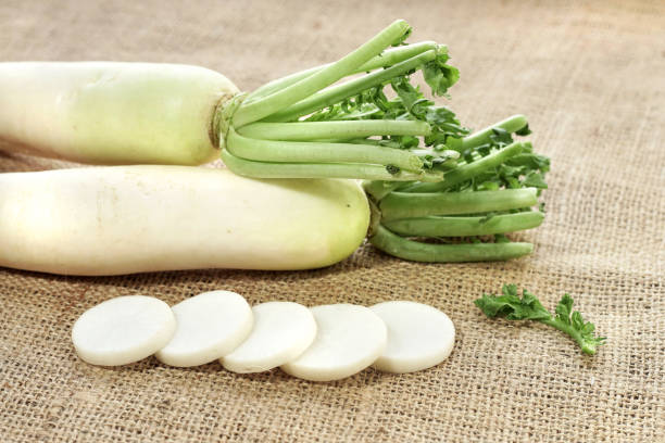 istock slices of white radish (raphanus sativus) on burlap background 1164633643