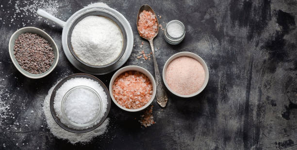 istock Types of salt on black background. 1164641197