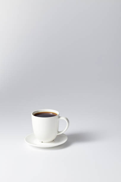 istock Cup of coffee black on bright gray background 1164642160