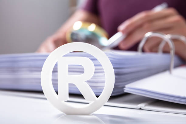 istock White Registered Trademark Sign Near Documents 1164644127