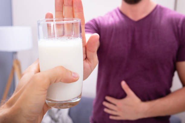 istock Man Rejecting Glass Of Milk 1164644378