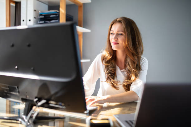 istock Happy Woman Working At Workplace 1164644782